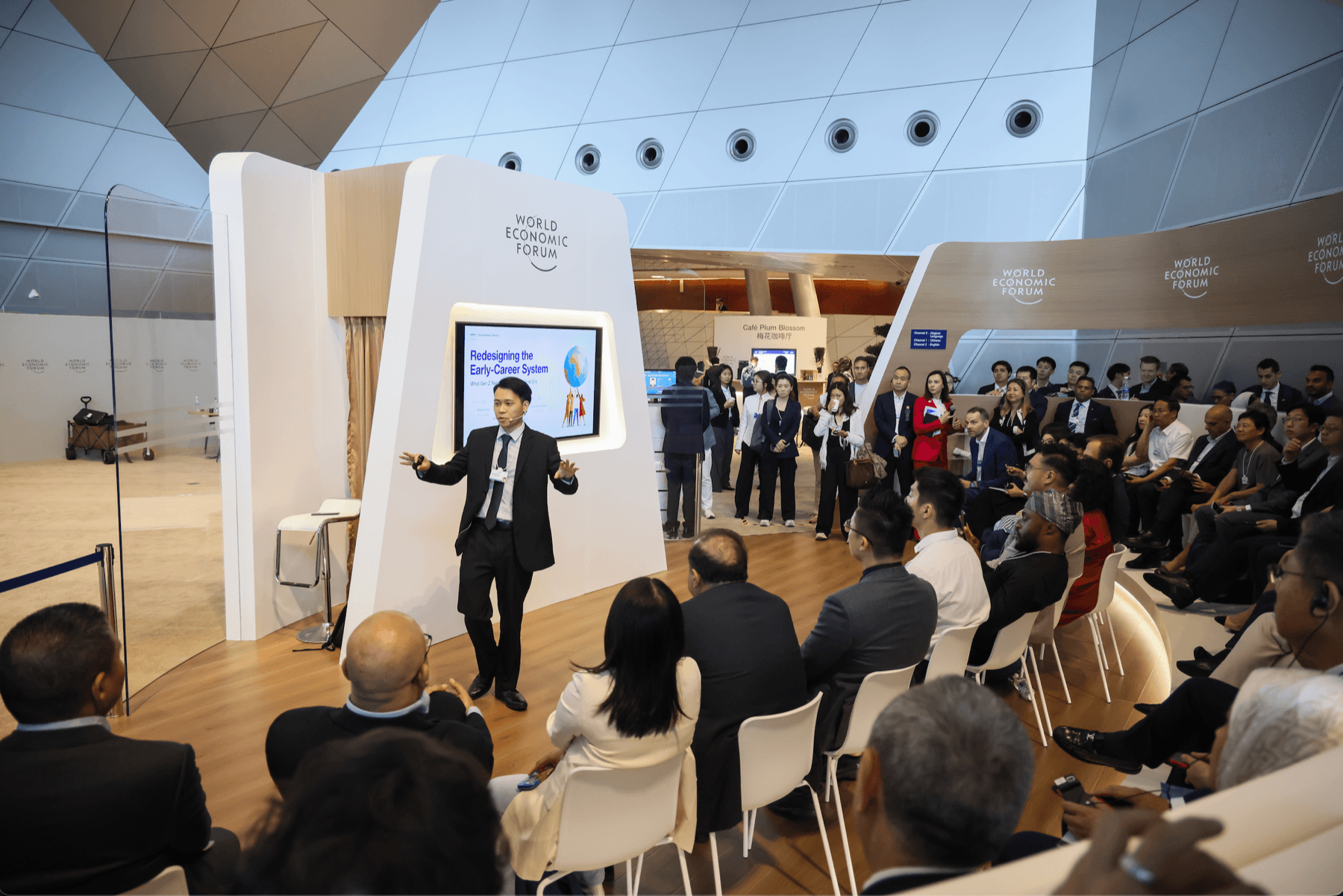 Qiqing He presenting to a full World Economic Forum room on Gen Z and AI workforce transformation